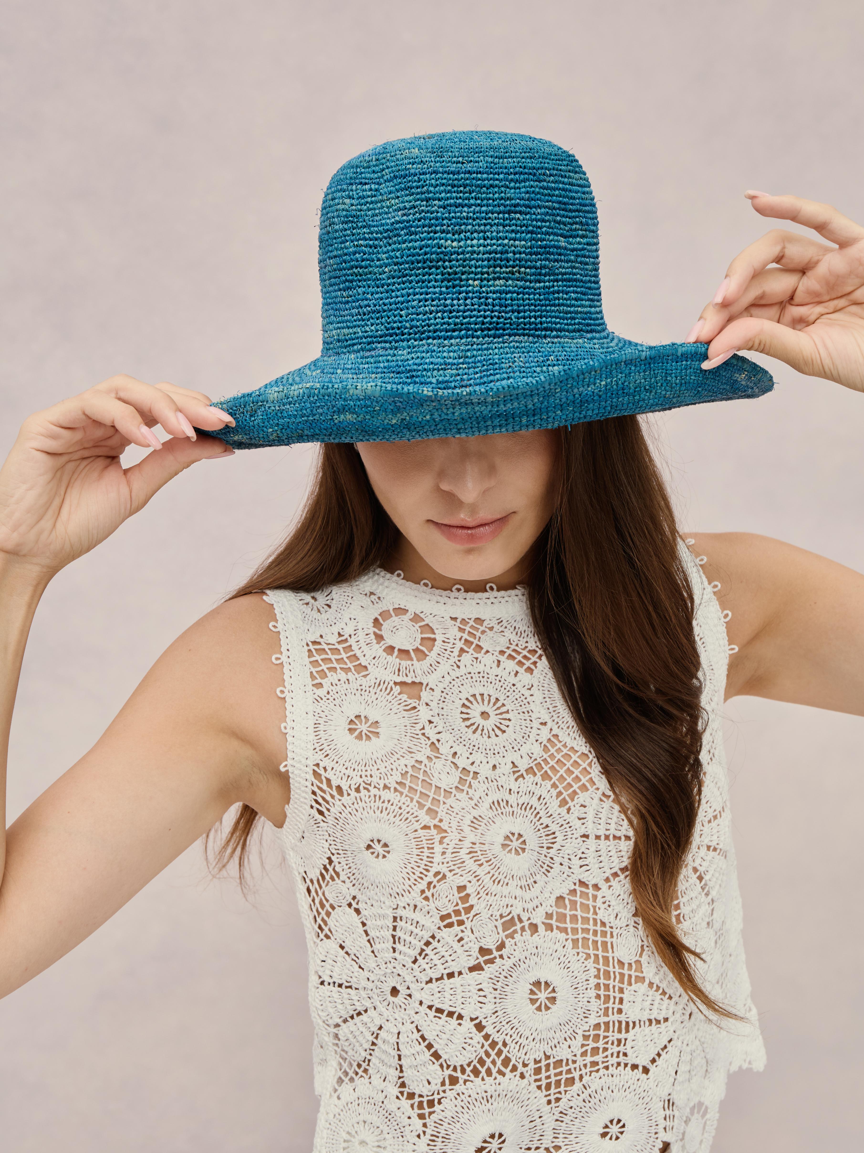 Club Hapuna Azores — lagoon Madagascar raffia cloche-inspired hat