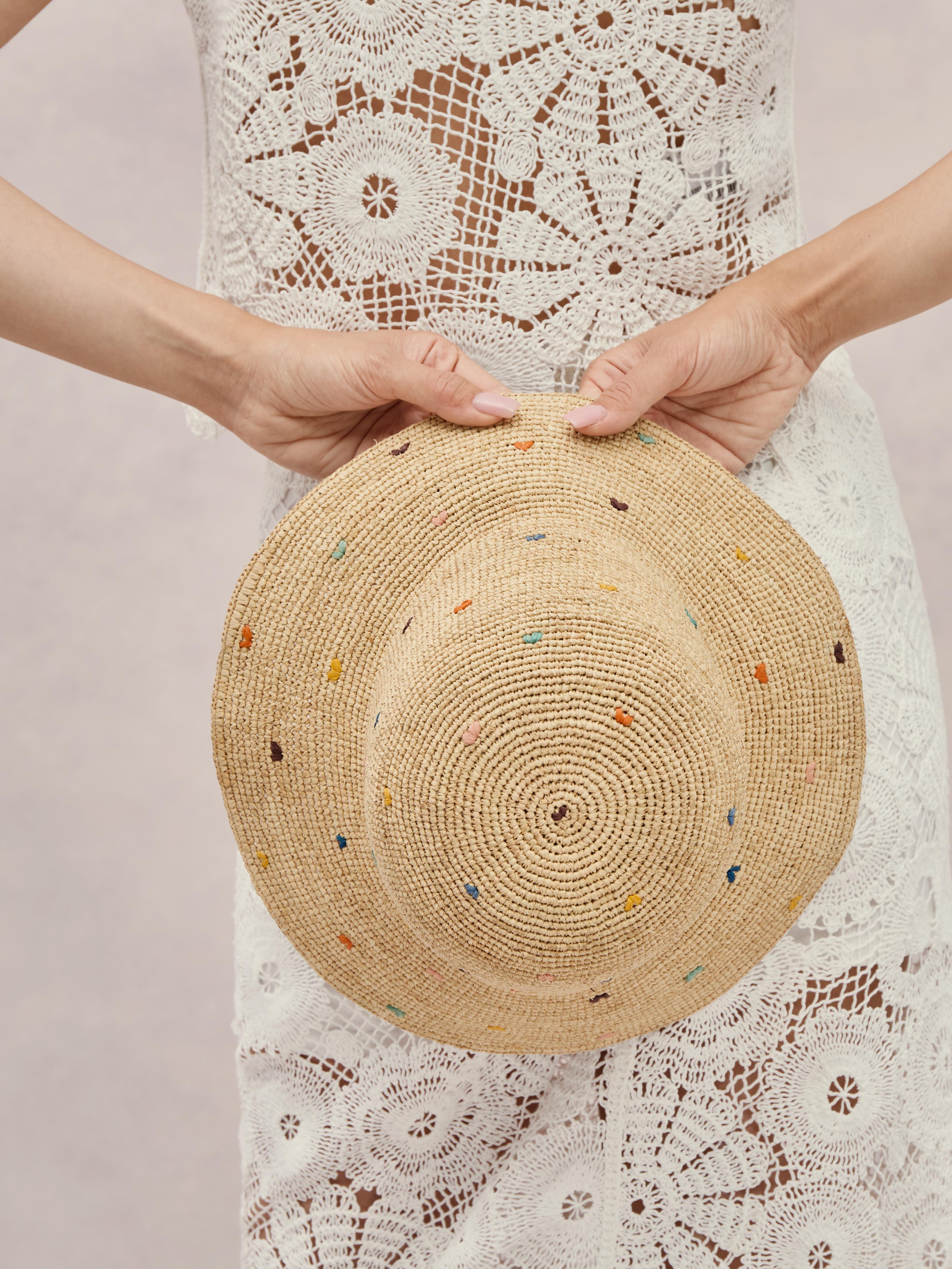 Club Hapuna Jeju — natural Madagascar raffia bucket hat colorful trim