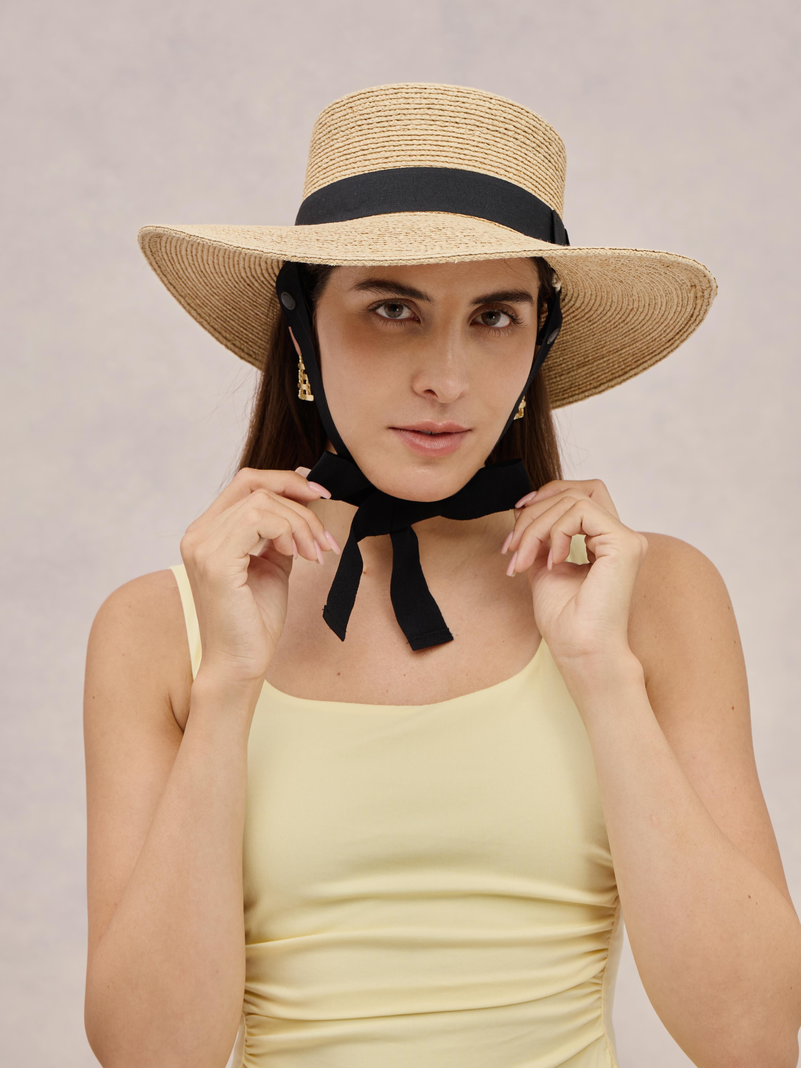 Club Hapuna Comino — charcoal Madagascar raffia boater with ribbon ties