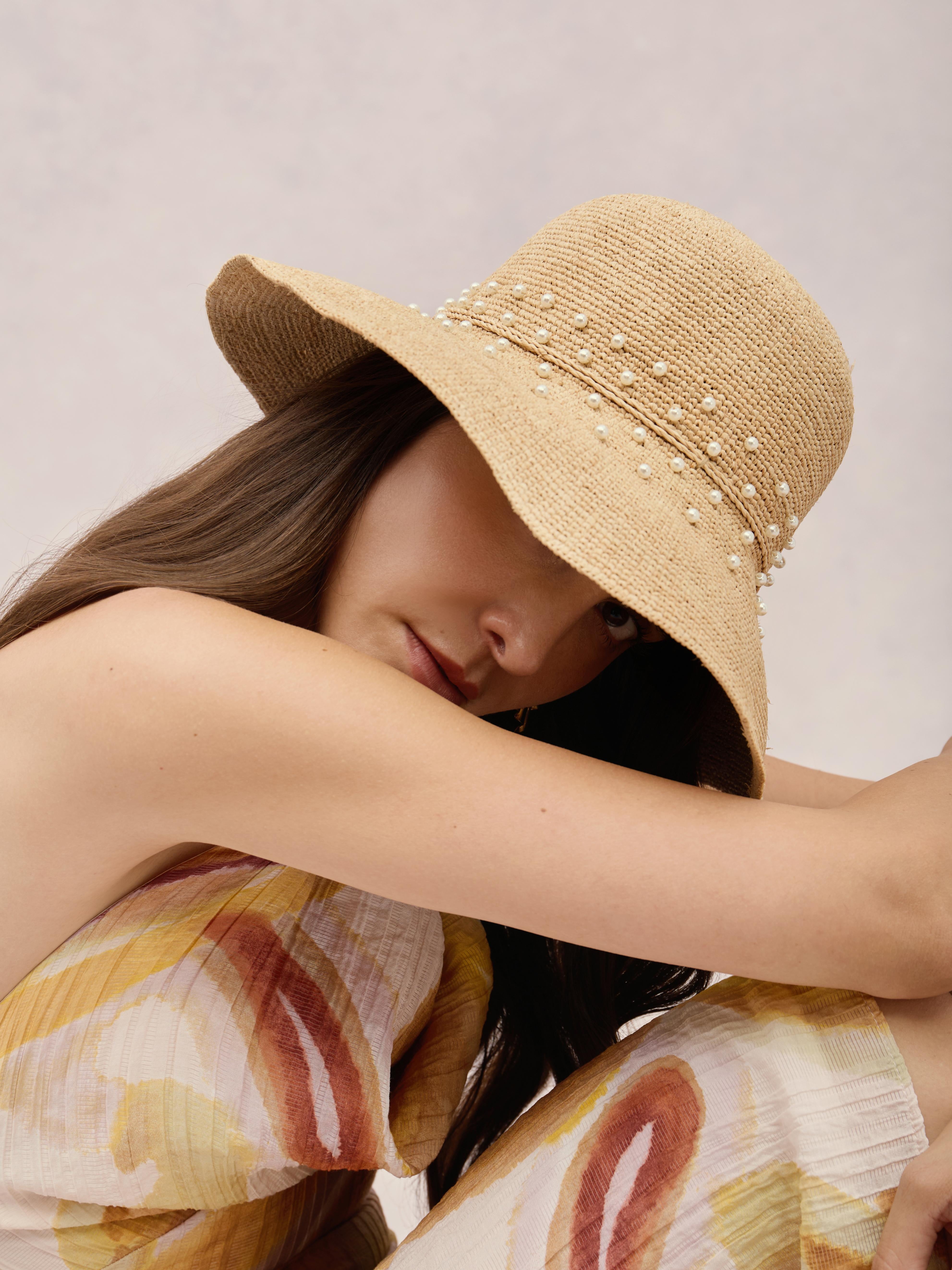 Madagascar raffia hat with pearl embellishment — Club Hapuna Corsica